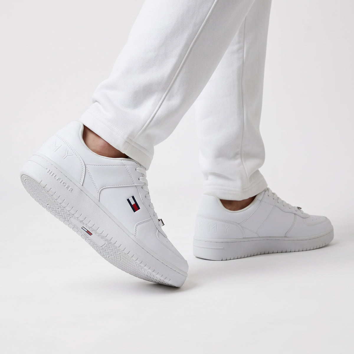 Tommy Hilfiger all‑white low top sneakers with flag logo