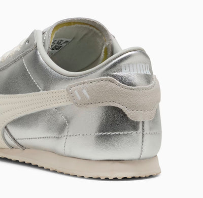 Puma low-profile silver metallic trainer with cream formstrip and textured off-white sole