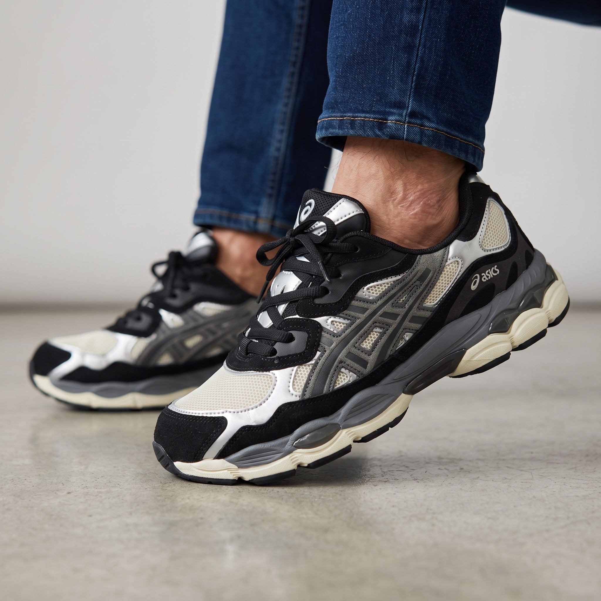 ASICS silver and black chunky runner sneaker with mesh panels and cream midsole