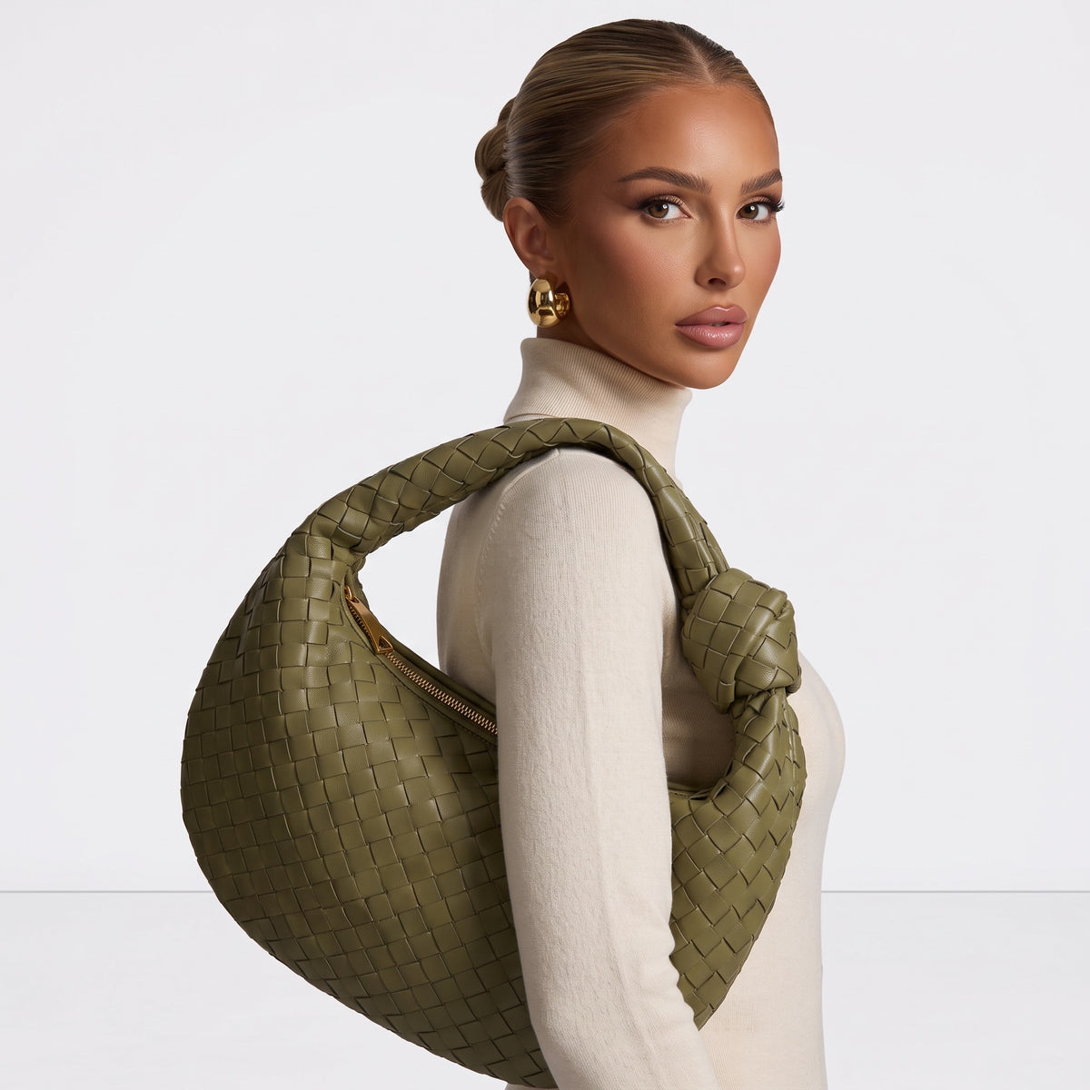 Olive intrecciato hobo bag with knotted shoulder handle and gold zipper