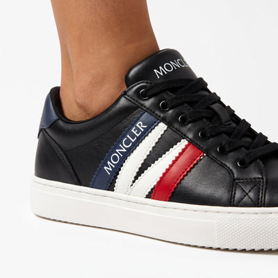 Moncler black low-top sneakers with blue white red stripes and white platform sole