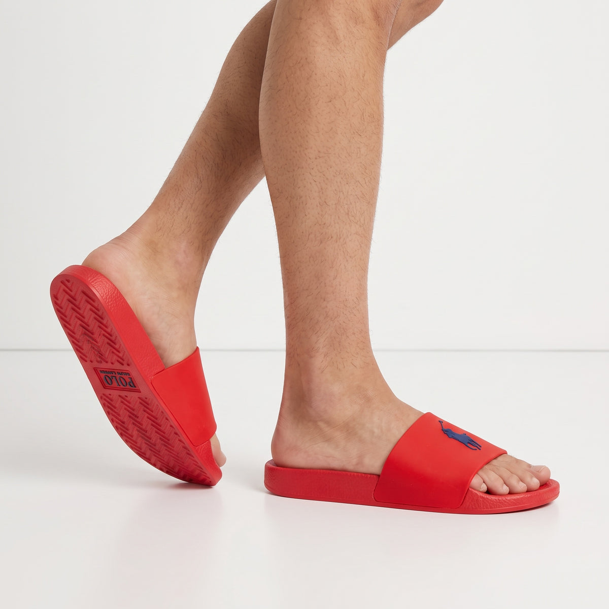 Red Polo Ralph Lauren rubber slides with navy pony logo