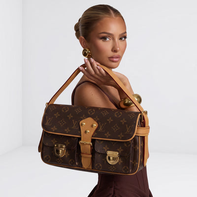 Louis Vuitton monogram shoulder bag with tan trim and gold hardware