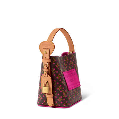 Louis Vuitton brown monogram bucket bag with pink perforations and natural leather handle