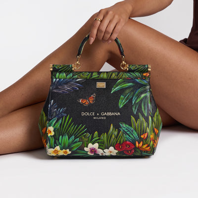 Dolce & Gabbana black Sicily top-handle bag with colourful tropical floral and butterfly print and gold hardware