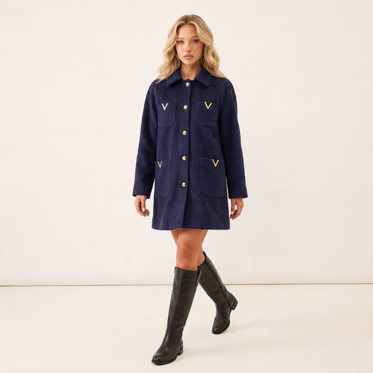 navy women's wool jacket with gold V hardware and gold buttons