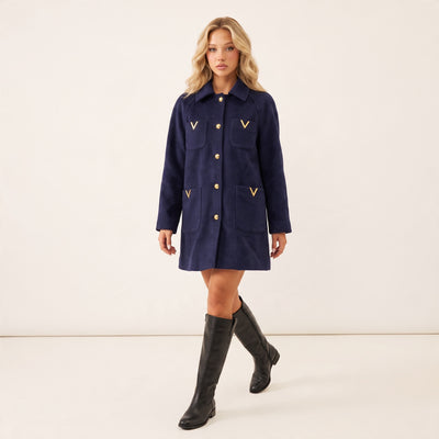 navy women's wool jacket with gold V hardware and gold buttons