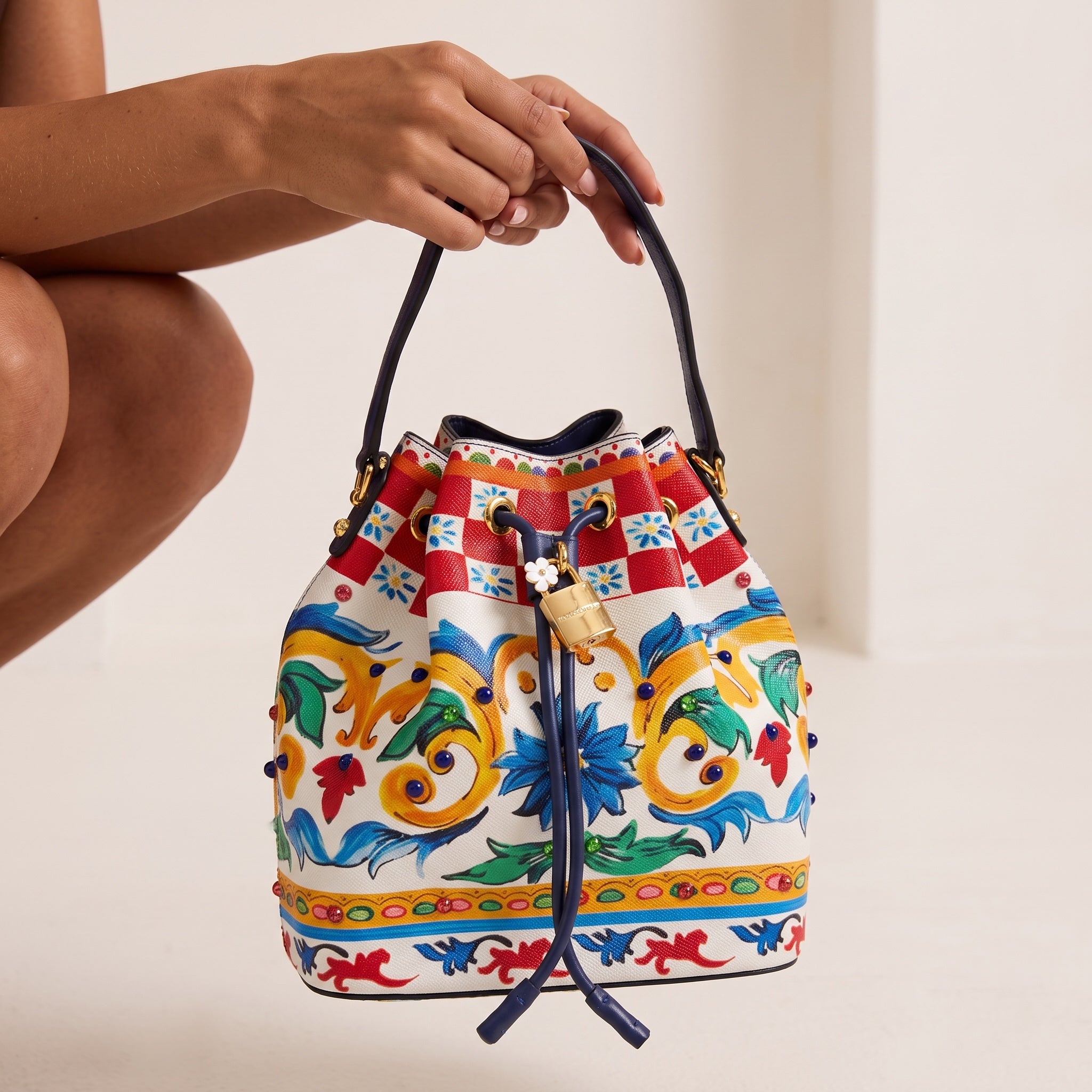 Dolce & Gabbana colorful baroque drawstring bucket bag with padlock charm