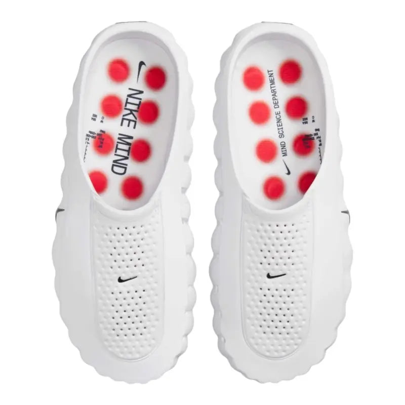 White Nike slip-on clog with perforated upper and red circular outsole pods