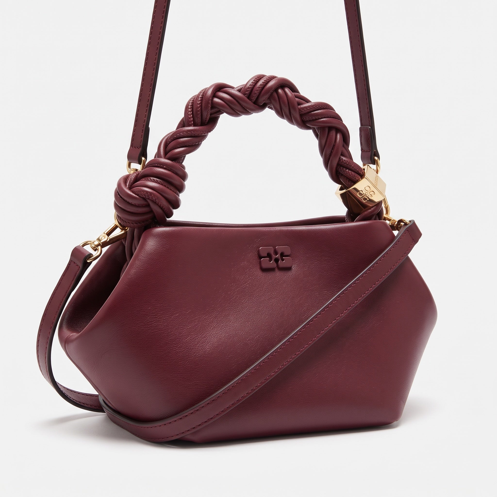 GANNI wine top-handle bag with braided knot handle and shoulder strap