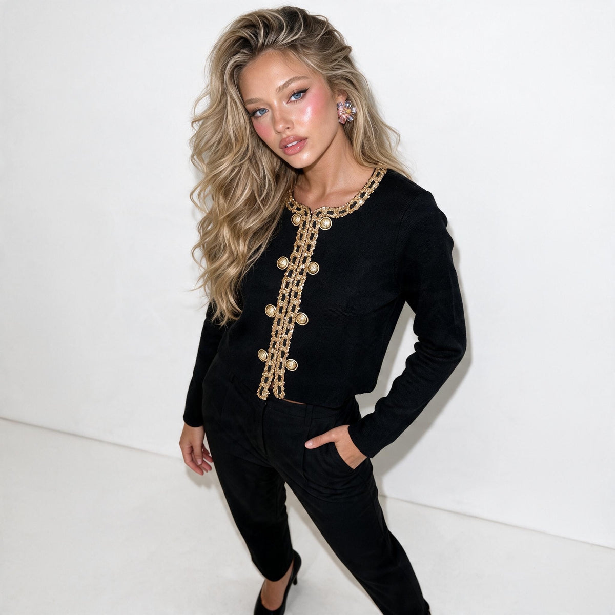 Black cardigan with gold chain trim and gold buttons