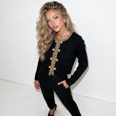 Black cardigan with gold chain trim and gold buttons