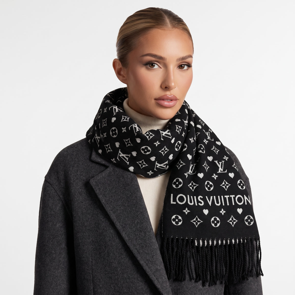 Black Louis Vuitton monogram shawl with fringed edges wrapped around model