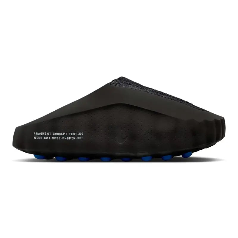 Black Nike Mind slip-on clog with blue circular pods on the sole