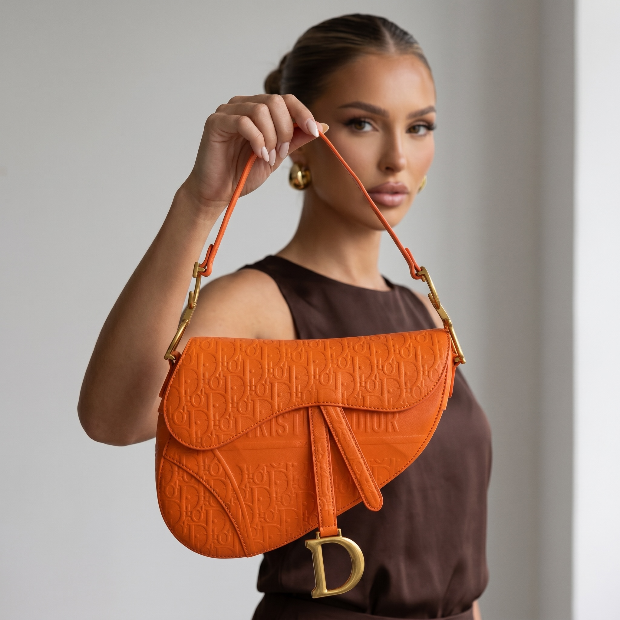 🧡 Christian Dior Saddle Bag – Orange Oblique Embossed Leather