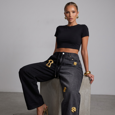 Schiaparelli Keyhole Embellished Two-Tone Wide-Leg Jeans 🔑✨