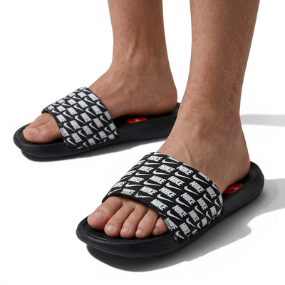 ⚫⚪ Nike All-Over Logo Slides – Streetwear Statement Edition