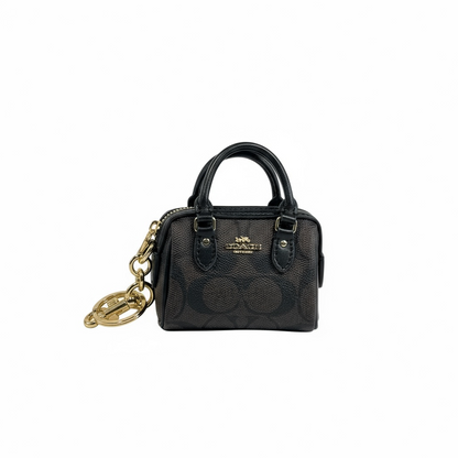 🤎 Coach Mini Signature Brown Bag Charm – Classic Elegance in Miniature Form ✨
