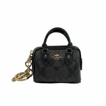 🤎 Coach Mini Signature Brown Bag Charm – Classic Elegance in Miniature Form ✨
