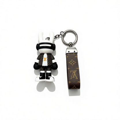 ICONIC LOUIS VUITTON CHARACTER KEYCHAIN – EXCLUSIVE DESIGNER COLLECTIBLE ✨🐰🖤