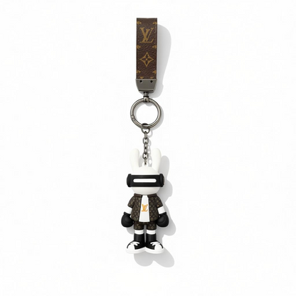 ICONIC LOUIS VUITTON CHARACTER KEYCHAIN – EXCLUSIVE DESIGNER COLLECTIBLE ✨🐰🖤