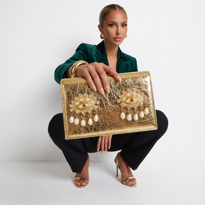 Schiaparelli Eye Embellished Gold Clutch – Full Metallic Couture 👁✨