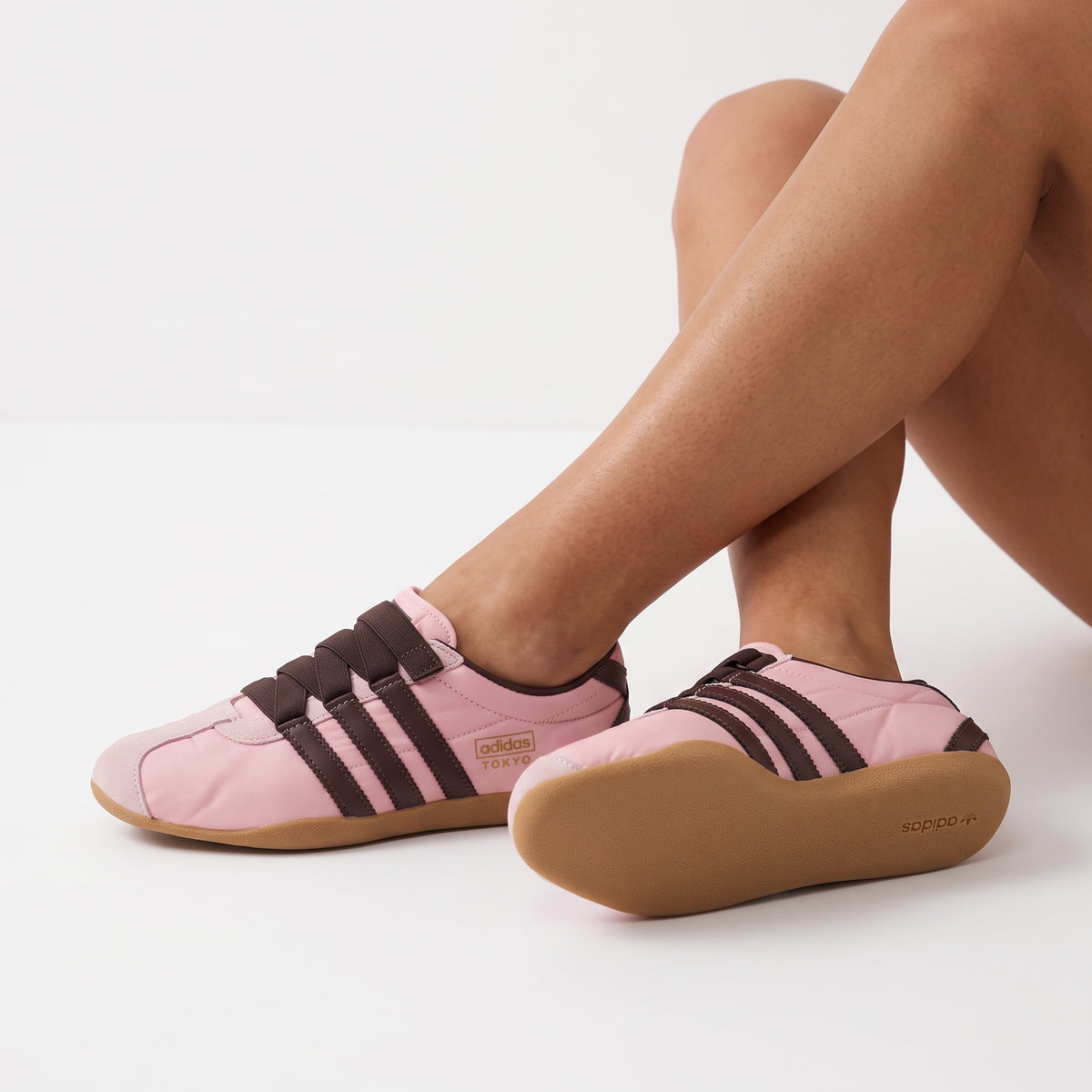 Pink adidas Tokyo low-top sneakers with brown stripes and gum sole