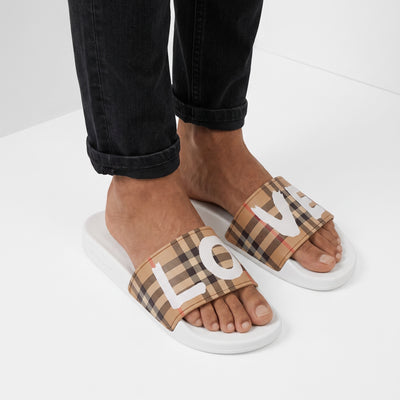 Burberry beige check slide sandals with white logo and white sole