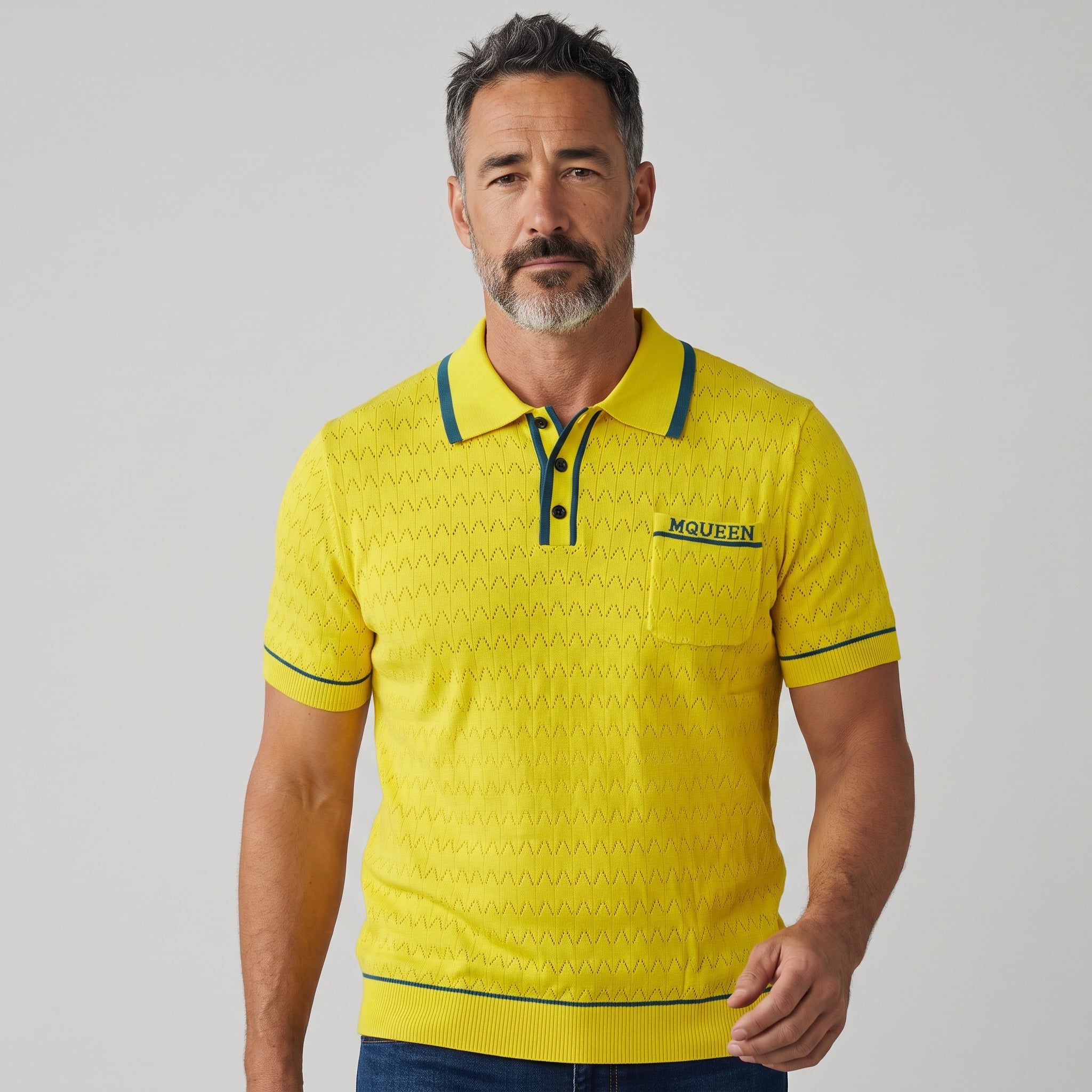 Yellow Alexander McQueen knit polo with blue trim and chest pocket