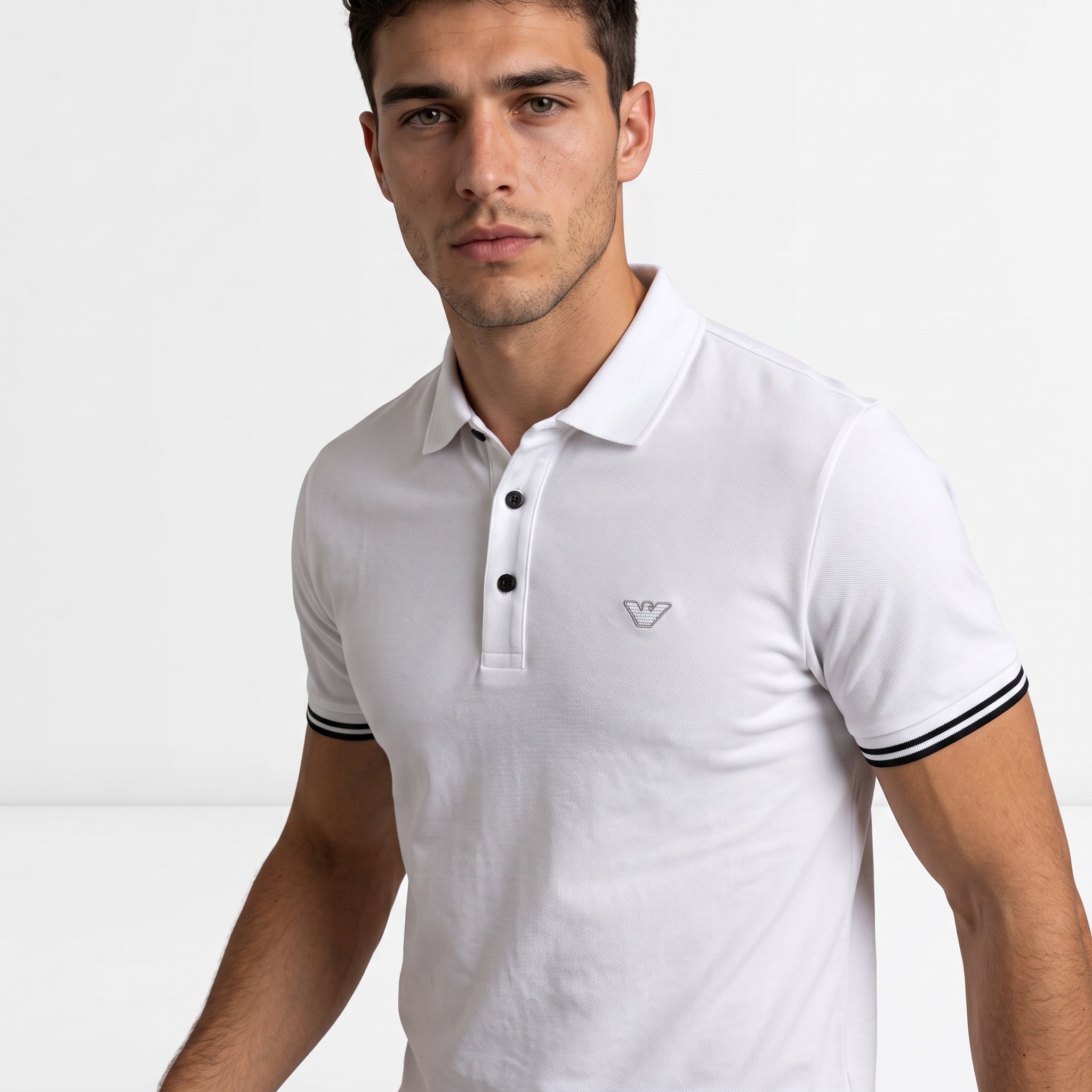 White Emporio Armani polo with black collar and sleeve trim, embroidered logo