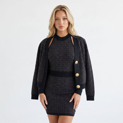 black halter fitted knit dress with tonal logo pattern and back zipper