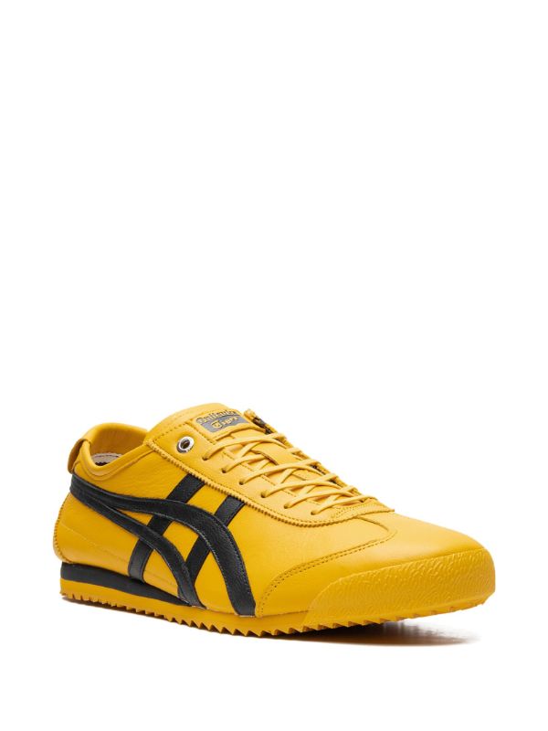 Yellow Onitsuka Tiger Mexico 66 sneaker with black stripes side view
