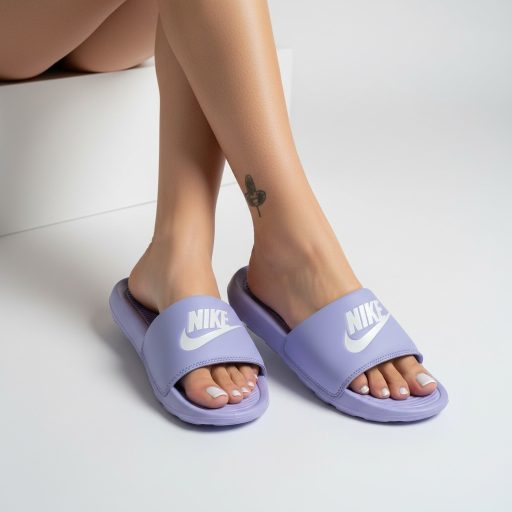 Lavender Nike Benassi JDI slides with white logo