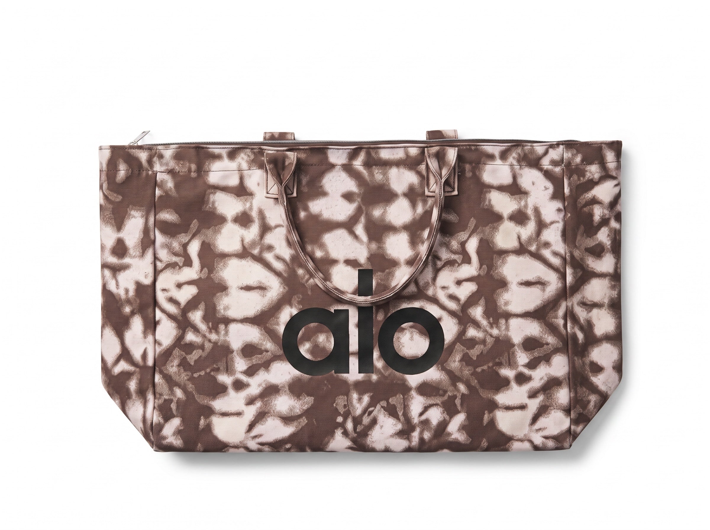 brown tie-dye printed Alo tote bag with top zip and handles