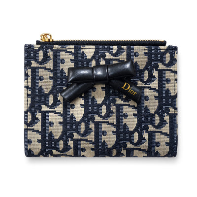 Dior navy jacquard card holder with black leather bow and gold zipper