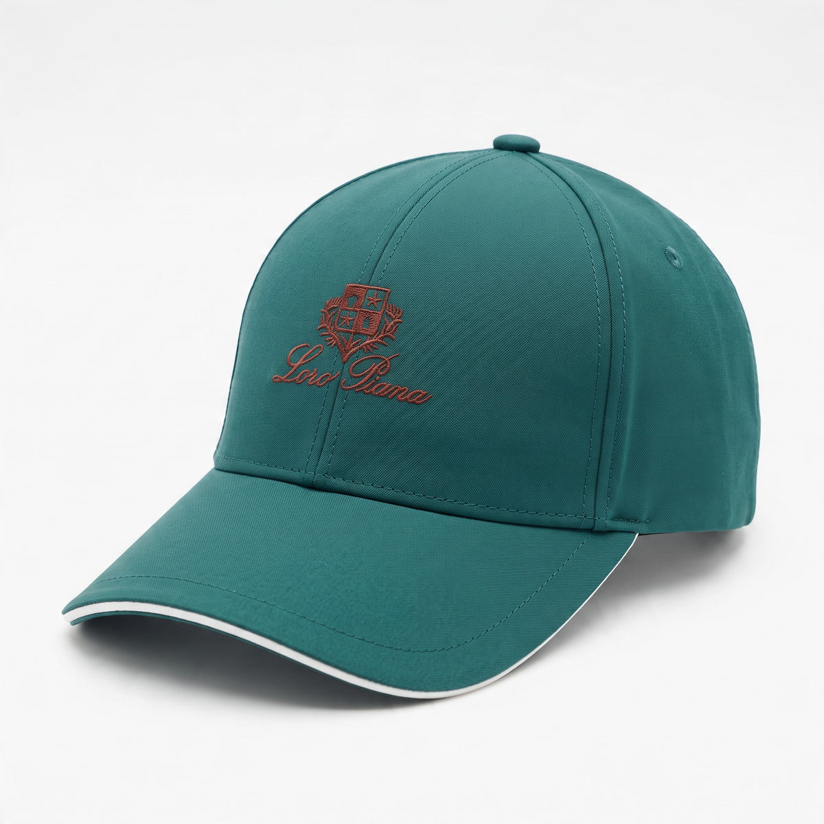 teal Loro Piana cap with embroidered crest and curved brim