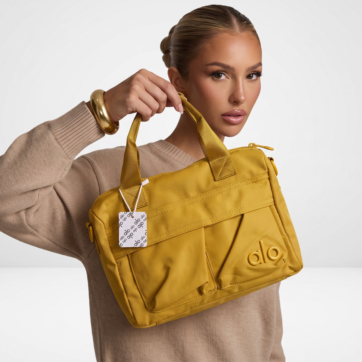 Alo mustard mini tote bag with top handles and front pockets