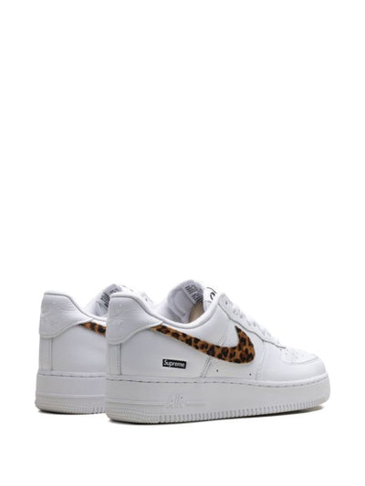 White Nike Air Force 1 Low sneaker with leopard-pattern Swoosh and Supreme box logo