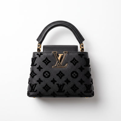 Black Louis Vuitton Capucines BB top-handle bag with gold LV plaque and monogram motif