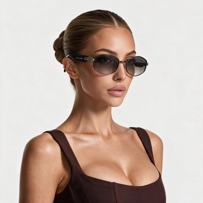 Bvlgari Serpenti black sunglasses with gradient lenses and snake-head hinge