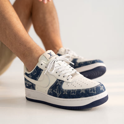 Louis Vuitton low-top trainers with blue monogram denim panels and white overlays