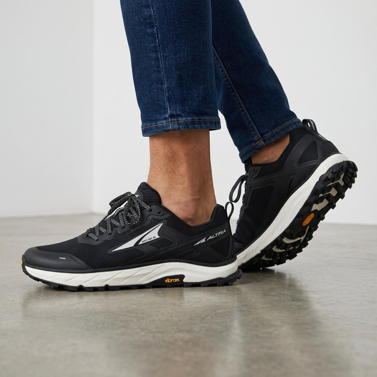 Altra black and white trail running shoes with Vibram outsole
