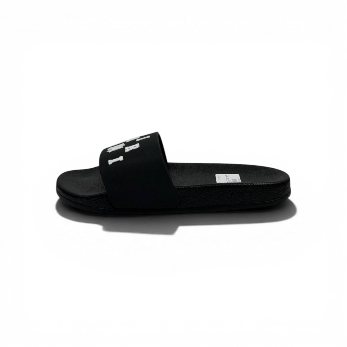 AMIRI Luxury Black Slide Sandals – Bold White Logo Design & Premium Streetwear 👟✨ - MASTERPIECE