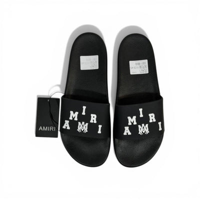 AMIRI Luxury Black Slide Sandals – Bold White Logo Design & Premium Streetwear 👟✨ - MASTERPIECE