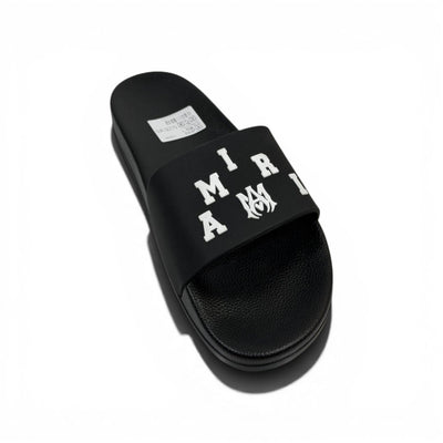 AMIRI Luxury Black Slide Sandals – Bold White Logo Design & Premium Streetwear 👟✨ - MASTERPIECE