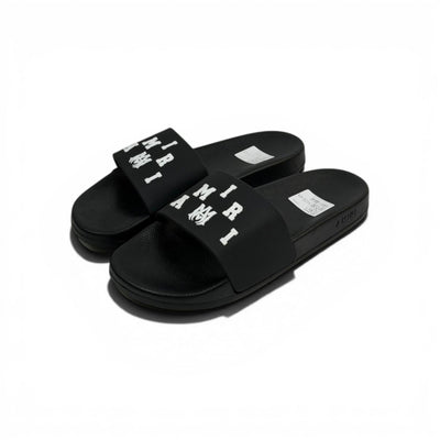 AMIRI Luxury Black Slide Sandals – Bold White Logo Design & Premium Streetwear 👟✨ - MASTERPIECE