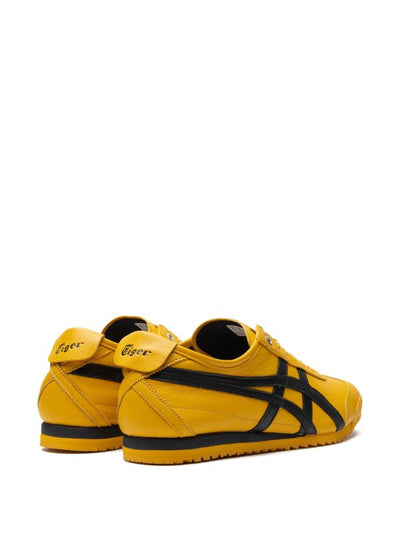Yellow Onitsuka Tiger Mexico 66 sneaker with black stripes side view