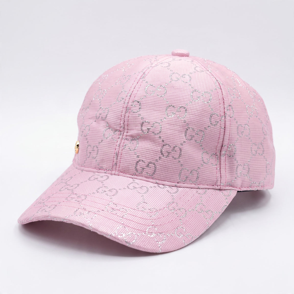 pink baseball cap with repeating GG logo and silver glitter