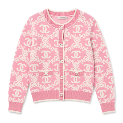 Pink Chanel cardigan with CC logo buttons and allover CC motif