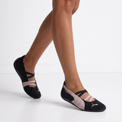 Puma ballet-style black trainers with dusty-pink accents and elastic straps